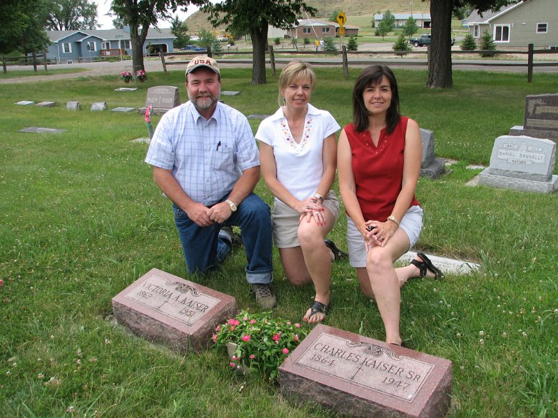 Dave0734.jpg - 2006 Siblings Dave Maloney, Lisa (Maloney) Williams and Tara (Maloney) Drake at the grave site of their maternal great-grandparents Victoria and Charles Kaiser; Miles City, MT.