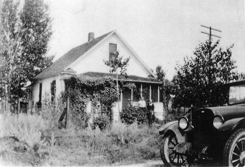 image025.jpg - 1922. Charles and Victoria Kaiser stand in front of house. The address of the Charles & Victoria Kaiser house was 421 Tatro St., Miles City, MT. About 1955 Charlie moved it across 5th street to 503 Tatro.