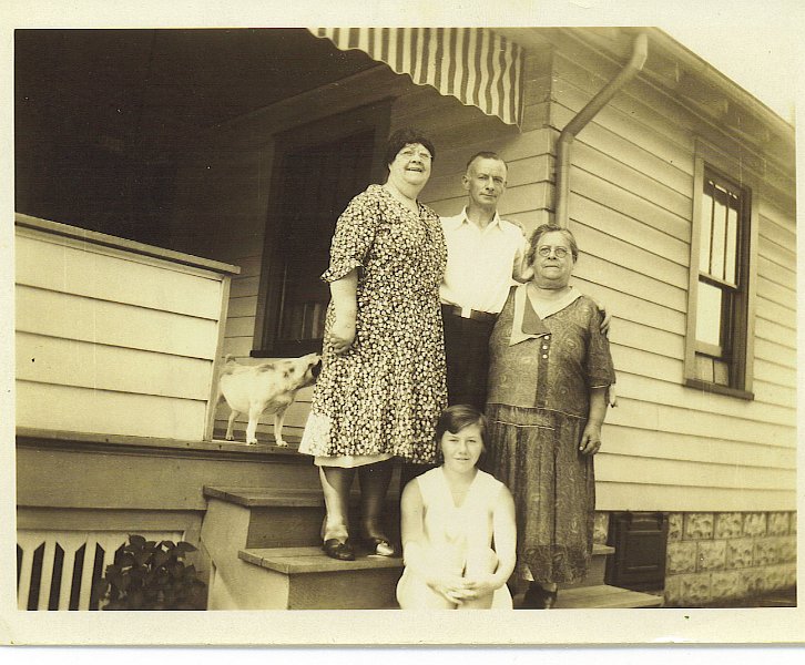 1925-Maloneyrelatives_UncleDave_Curry_AuntAnn.jpg - Per uncle Joe Maloney, March 2005, "The two older ladies were your great great Aunts. The man in the picture is your great Uncle Dave. A long time scouter who's memorabilia of Scouting I have.  The ladies your Great great aunt's Carry and Martha. They are your great great grandmother's sisters the young one in the front is my sister Ann.  The picture was taken in Akron, Ohio date unknown.  I have a number of pictures of Uncle Dave in scouting scenes."