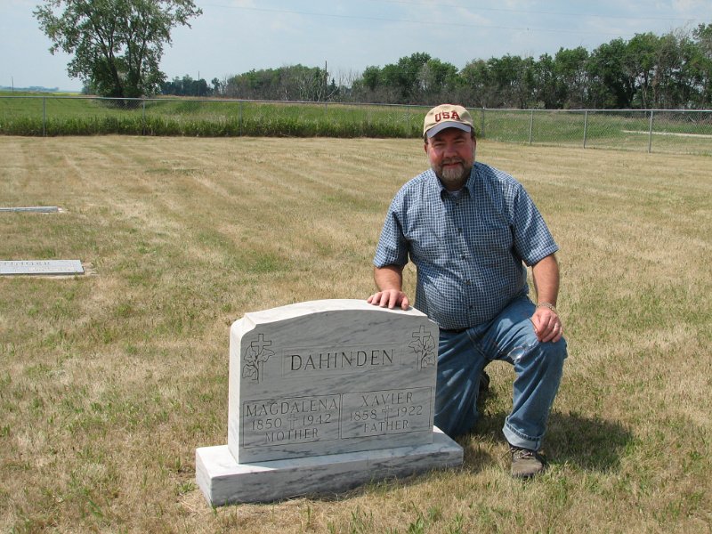 Dave0316.jpg - David J. Maloney Jr. at grave of his maternal Great-Great Grandparents Magdalena and Xavier Dahinden, Tolley, ND 2006