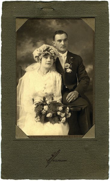 jz_013.jpg - Photographer is "Louis W. Olsen / St. Cloud, Minn". Appears to be a brother of Katie (Ethen) Zeltinger with his bride.