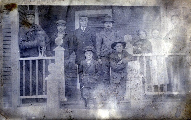 jz_078.jpg - Unknown family gathers on porch.