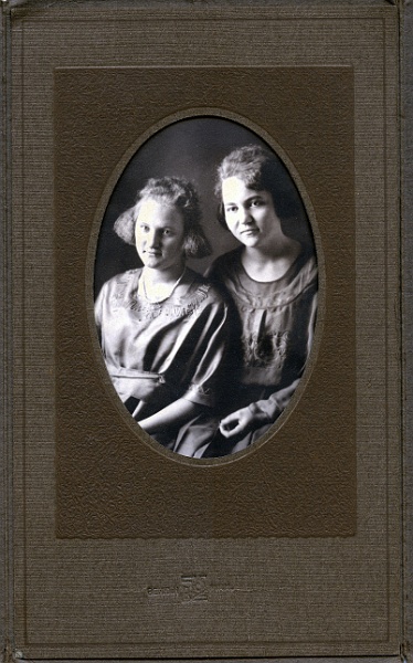 jz_027.jpg - Unknown girls. Photographer's stamp is from Bemidji, Minn. Pre-Nazi era logo incorporates the swastika, an ancient symbol used by, among others, Hindu and Native Americans.