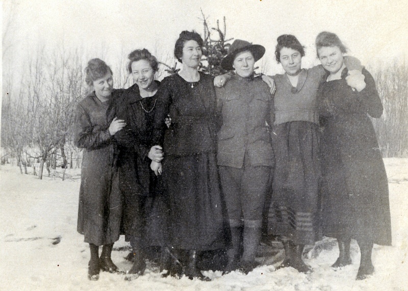 jz_086.jpg - The reverse inscribed, "A Happy-go-Lucky Group - 1920"; The second girl from the right is Mary F. "Mamie" Fuchs who married Katie (Ethen) Zeltinger's brother, Joseph Ethen. The girl at the far right is Louise Zeltinger.