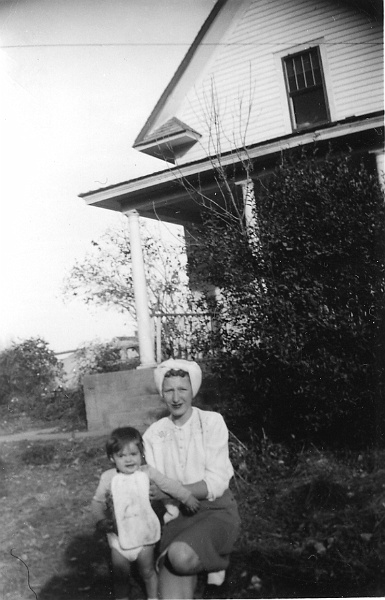 zeltinger055.jpg - Baby Katherine Maloney with Shirley Zeltinger (Frank's daughter); Oct. or Nov. 1948 on the Ignatius and Katie Zeltinger farm near Tolley, ND.