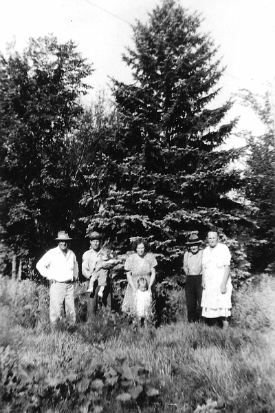 zeltinger058.jpg - On Ignatius and Katie Zeltinger farm near Tolley, ND; John, Ed and Jerry, Agnes and Rae Jeane, Ignatius and Katie; 1946